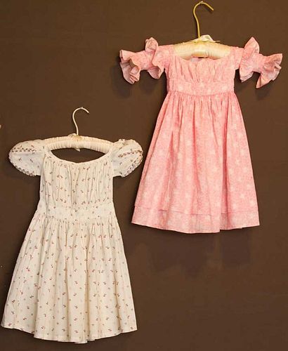 TWO TODDLERS' CALICO DRESSES, 1830-1840