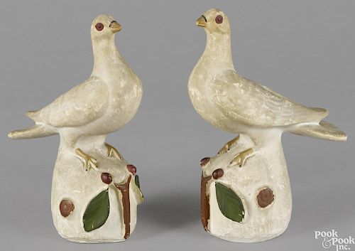 Pair of Pennsylvania chalkware dove banks, 19th c., 11'' h.