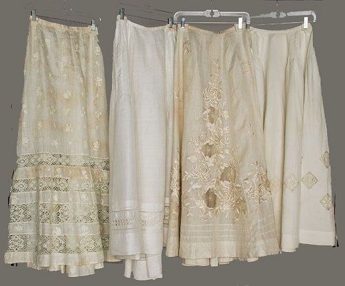 FOUR LINEN & LACE WHITE SKIRTS, 1900-1910