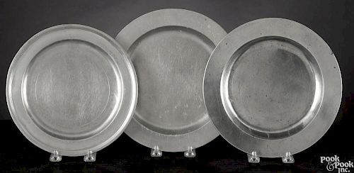 Three Massachusetts pewter plates, 18th c., bearing the touches of Nathaniel Austin, John Skinner