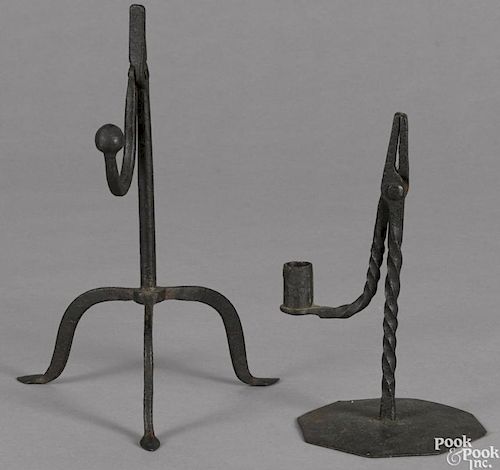 Two wrought iron rush light holders, 18th/19th c., 10'' h. and 7 1/2'' h.