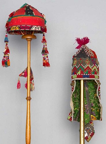 TWO EMBROIDERED TRIBAL HATS, CENTRAL ASIA, c. 1900