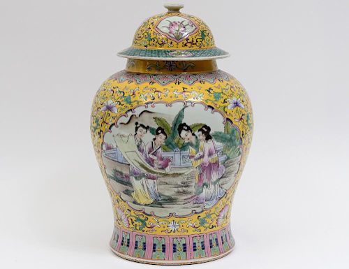 YELLOW GROUND FAMILLE ROSE PORCELAIN JAR AND COVER