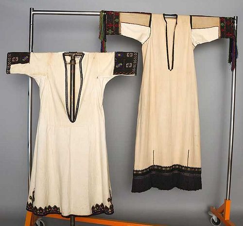 TWO EMBROIDERED REGIONAL DRESSES, c. 1900