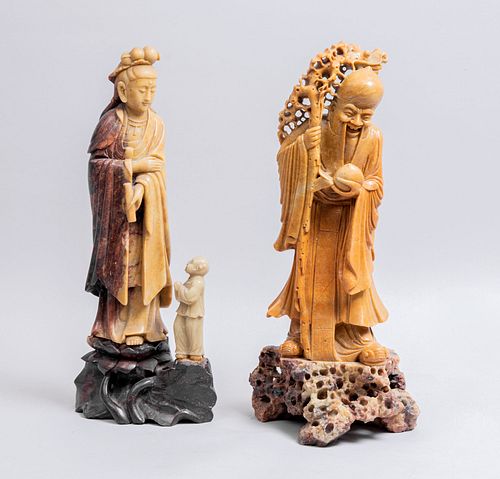 Shou Xing y diosa oriental. SXX. Tallas en piedra jabonosa. 48 cm de altura (mayor). Piezas: 2
