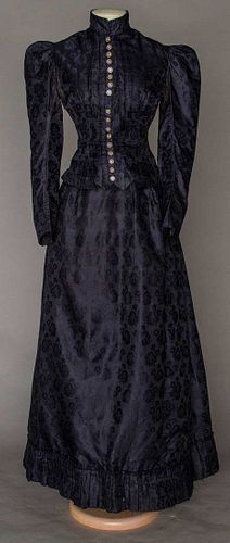 NAVY BROCADE BUSTLE DAY DRESS, LATE 1880s