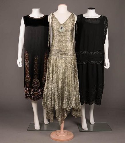 TWO BLACK BEADED PARTY DRESSES, MID 1920s