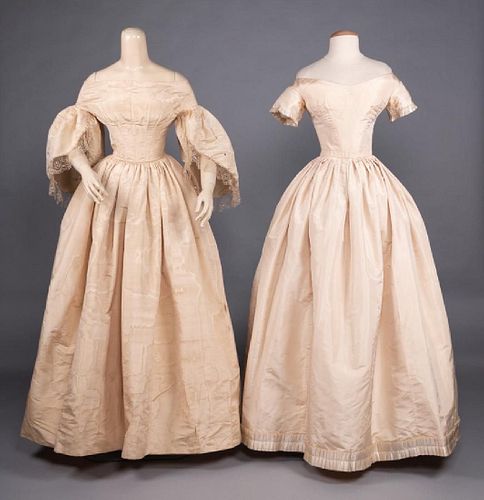 TWO CREAM SILK WEDDING GOWNS, 1850s