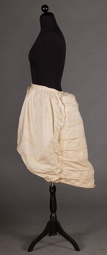 LOBSTER TAIL BUSTLE, 1870-1880