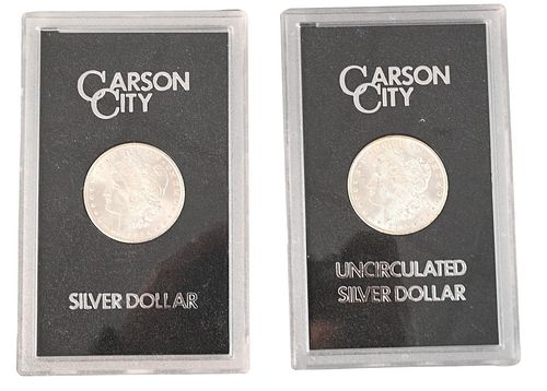 Two 1882 Carson City Morgan Silver Dollars.
