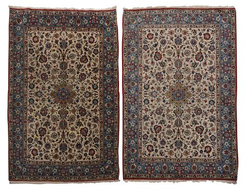 Two Similar Persian Rugs