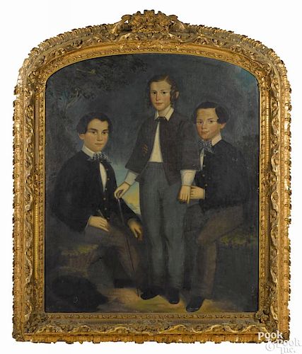 American oil on canvas family portrait, mid 19th c., depicting three brothers