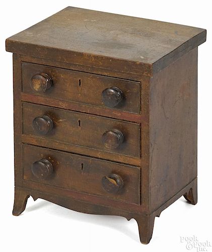 Miniature Pennsylvania walnut chest of drawers, ca. 1830, 12 1/2'' h., 10'' w.