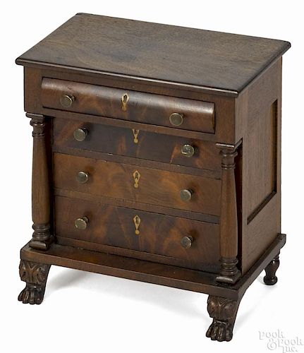 Miniature Pennsylvania Empire mahogany chest of drawers, ca. 1840, 11 1/4'' h., 9 3/4'' w.