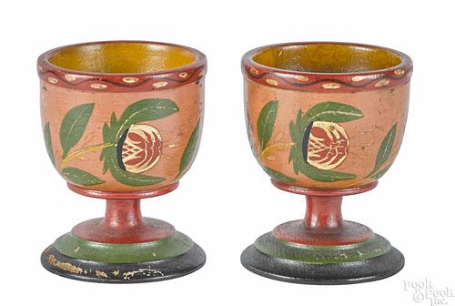 Joseph Lehn (Lancaster, Pennsylvania 1782-1892), pair of turned and painted egg cups, 3'' h.