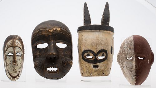 4436336: Group of 4 African Carved Wood Masks T8KBA