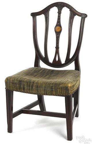 Hepplewhite child's mahogany shieldback chair, 19th c., with a paterae inlaid back, 30'' h.