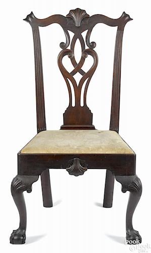 Philadelphia Chippendale walnut dining chair, ca. 1770, with four carved shells, a voluted splat