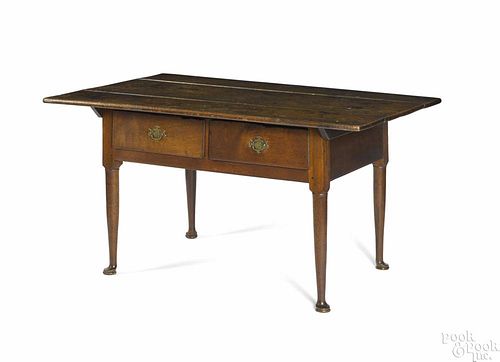 Pennsylvania walnut tavern table, late 18th c., 29'' h., 54'' w., 35 1/2'' d.
