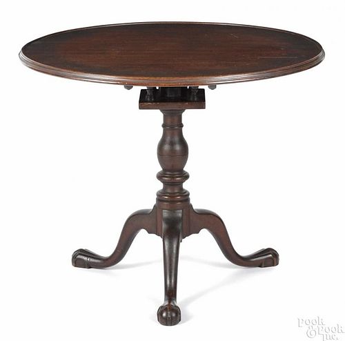 Pennsylvania Chippendale walnut tea table, ca. 1770, with a birdcage support, a baluster standard
