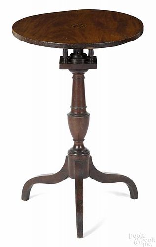 Pennsylvania Federal walnut candlestand, ca. 1805, with an eagle inlay and a birdcage support