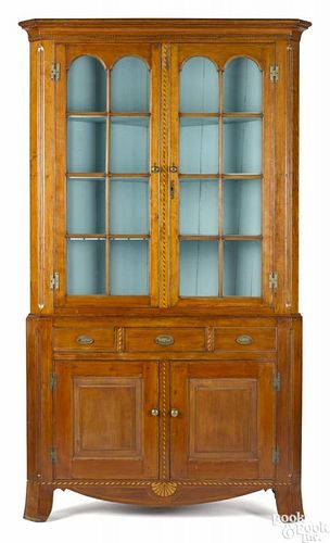 Pennsylvania Federal cherry corner cupboard, early 19th c., with overall barberpole inlay