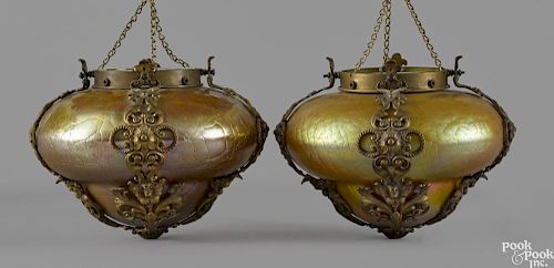 Pair of Steuben gold iridescent crackle glaze hanging lights with brass mounts