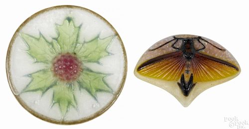 Two G. Argy Rousseau pendants, 2 1/2'' dia. and 1 1/2'' h., 2 1/4'' w.