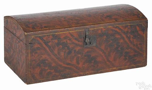 New England painted pine dome lid trunk, early 19th c., retaining its original red and black