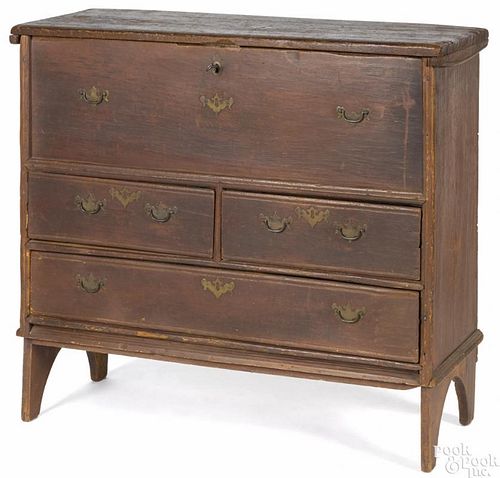 New England William & Mary painted pine mule chest, ca. 1740, retaining an old red surface, 37'' h.
