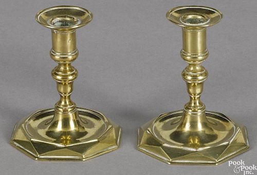 Pair of George III brass tapersticks, mid 18th c., with faceted octagonal bases, 3'' h.