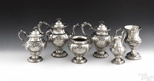 New York six-piece repoussé silver tea service, mid 19th c., bearing the touch of Platt & Brother