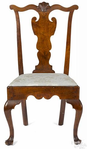 Pennsylvania Queen Anne walnut dining chair, ca. 1765, with a shell carved crest and trifid feet.