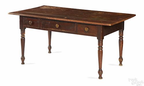 Lancaster, Pennsylvania painted poplar tavern table, ca. 1840, retaining an old red surface
