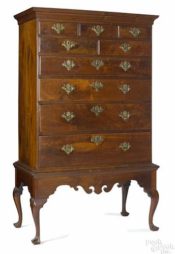 Pennsylvania Queen Anne walnut chest on frame, ca. 1770, with highly figured drawer fronts