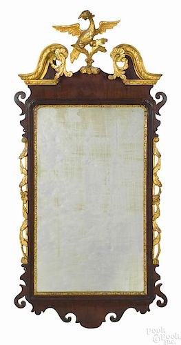 Chippendale mahogany and parcel gilt looking glass, late 18th c., with a phoenix crest, 47 1/2'' h.