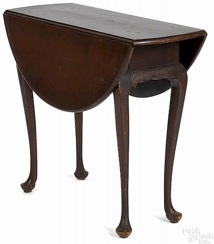 Queen Anne maple drop leaf table retaining a red stained surface, 27 1/2'' h., 13'' w., 32 3/4'' d.