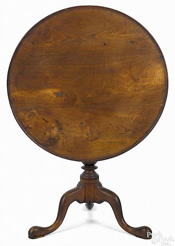 Pennsylvania Queen Anne walnut tea table, ca. 1770, with a birdcage support, baluster standard