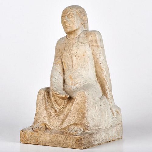 SCULPTURE OF A SEATED MAN