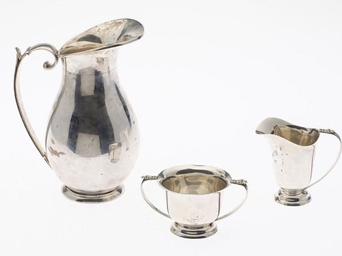 Sanburn Mexican Silver Pitcher and a Cream and Sugar