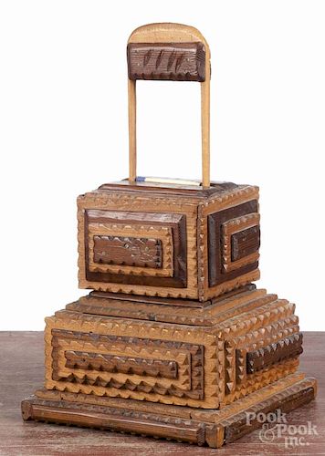 Tramp art carved match dispenser, 20th c., with a one-drawer base, 12 1/2'' h., 6 3/4'' w.