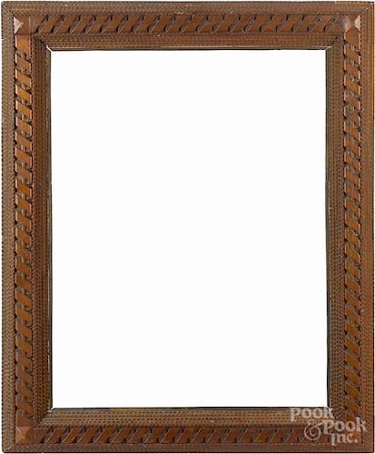 Tramp art carved frame, ca. 1900, with unusual carved ribbon border, overall - 24 1/2'' x 19 3/4''