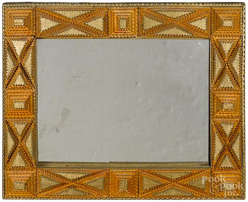Tramp art carved and painted mirror, ca. 1900, with gilt and stained surface, overall - 23'' x 27''.