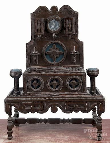 Tramp art carved sewing box, ca. 1900, with wall pockets, pincushions, spool holders