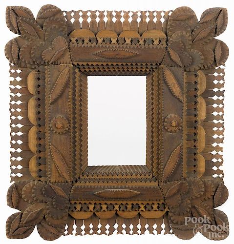 Tramp art carved frame, ca. 1900, overall - 16'' x 15'', rabbet - 6 1/2'' x 4 1/2''.