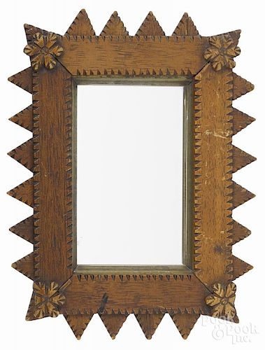 Two tramp art carved mirrors, ca. 1900, overall - 11 3/4'' x 10 1/2'' and 9 3/4'' x 7 1/4''.