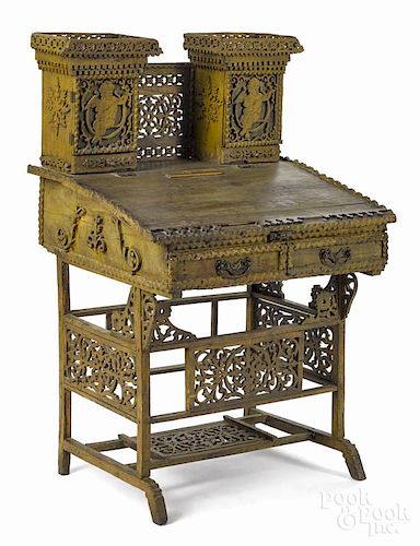 Full-size tramp art lady's writing desk, ca. 1900, with open work and blind carving