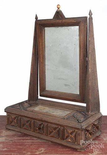 Tramp art carved shaving mirror, ca. 1900, the upper fabric pad inscribed Toilet