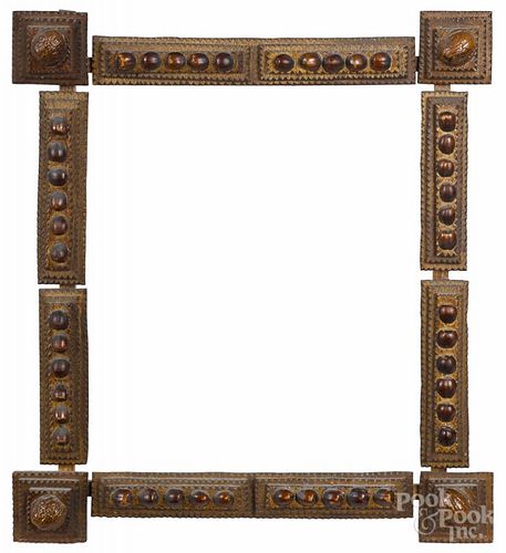 Two tramp art carved frames, ca. 1900, one with applied walnuts and acorns