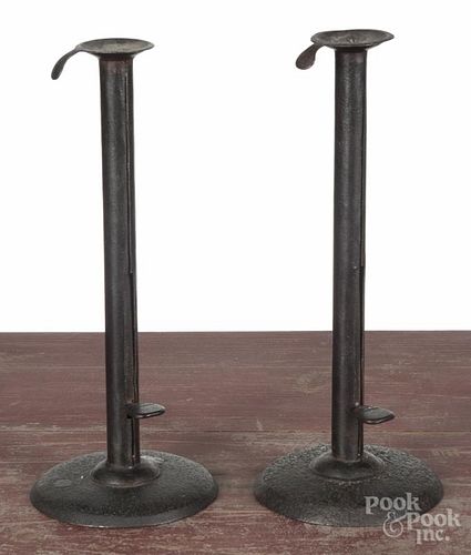 Pair of wrought iron hogscraper candlesticks, 19th c., 11 3/4'' h.
